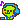 tiny pixel art of a little green guy listening to music on blue headphones while bopping his head from side to side. He is smiling and there are colorful music notes around him.